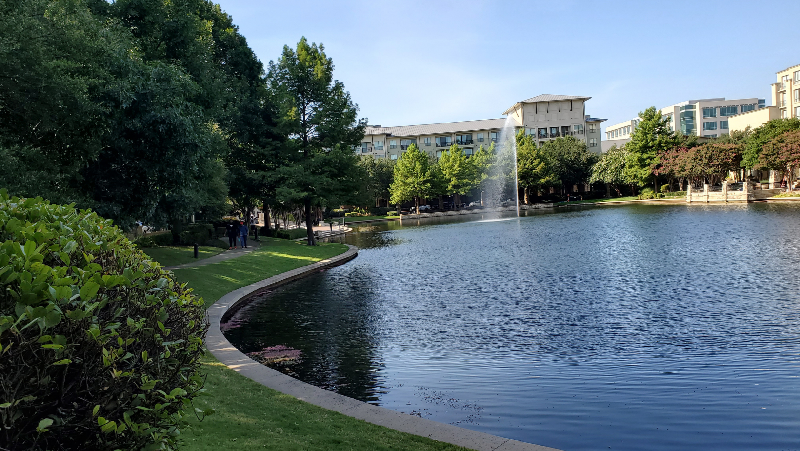 man made lake with fountain in frisco texas